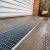 Driveway Drainage Solutions for Sloped Terrain